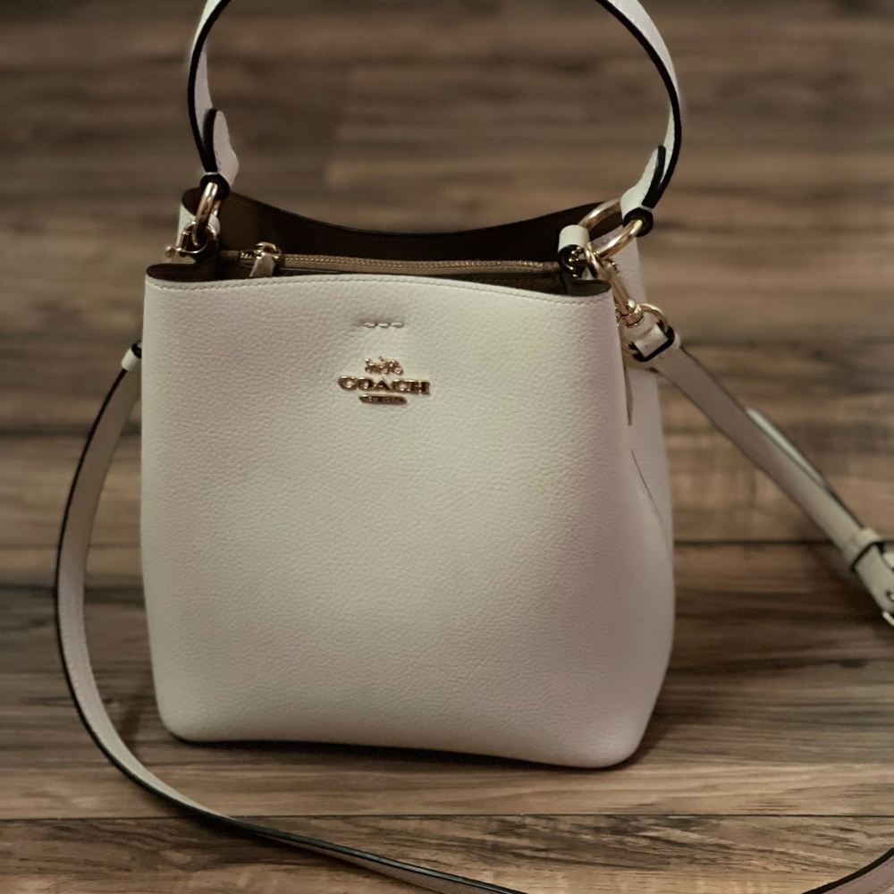 White hand bag